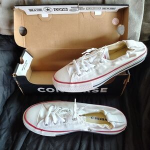 Converse Low Top Slip-On Sneakers in White with Red Trim